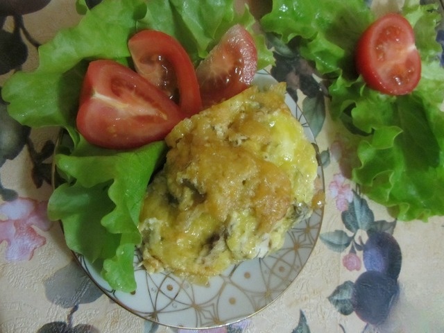 Куриная грудка с шампиньонами, запеченная под сыром