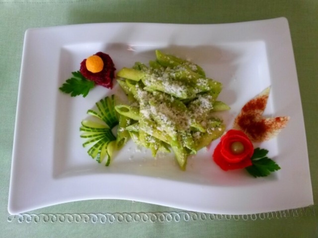 Pasta in a creamy sauce with wild garlic