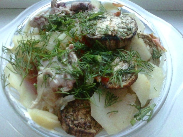 Stewed potatoes with meat and eggplant