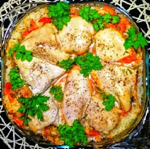 Chicken with rice and vegetables in the oven