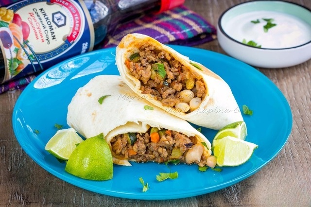 A burrito with beef and beans