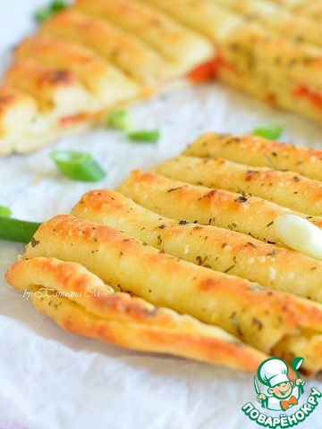 Grilled flatbreads with tomatoes and garlic