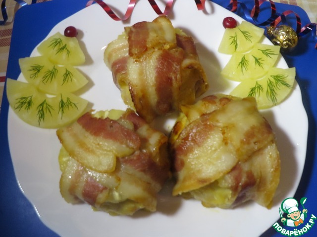 Meatballs wrapped in bacon with pineapple