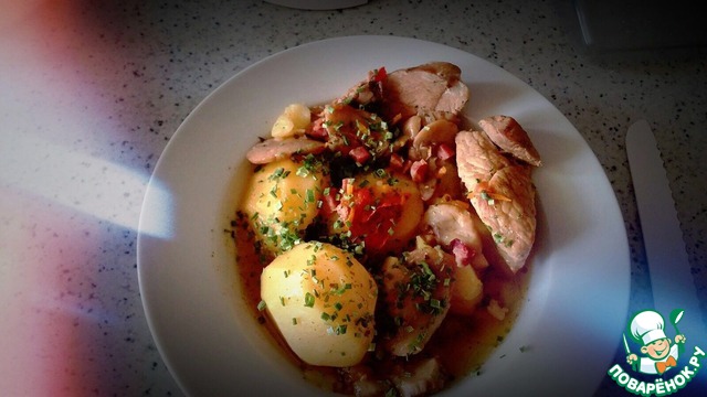 Meat stewed with potatoes in a pressure cooker