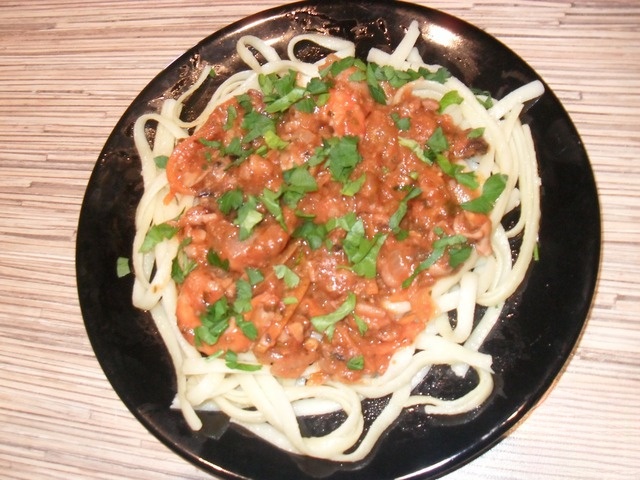Seafood pasta in tomato sauce