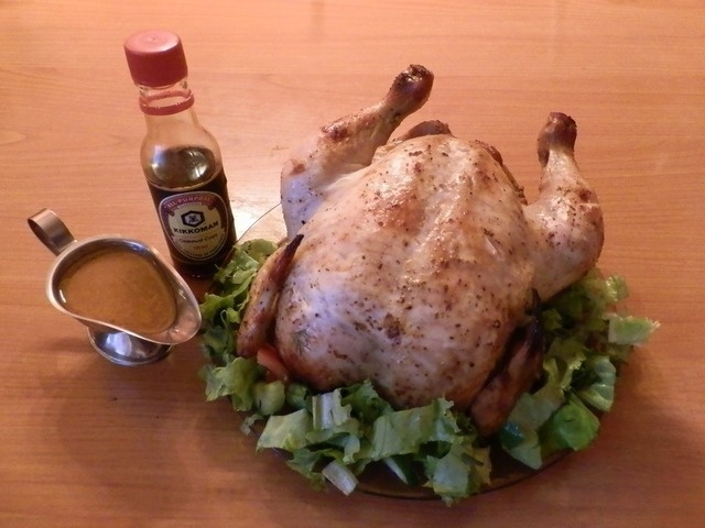 Chicken baked with tangerines, mustard and honey