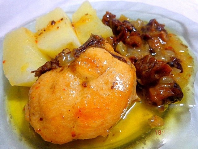 Chicken braised in Apple cider sauce with mushrooms