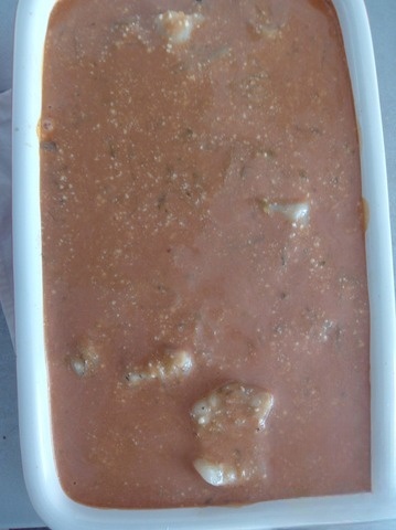 Fish with vegetables in cheese and tomato sauce