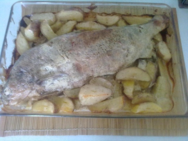 Baked whitefish with potatoes