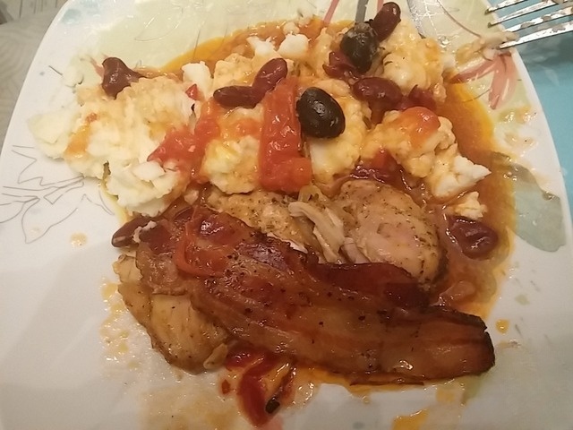 Chicken fillet topped with bacon vegetable gravy