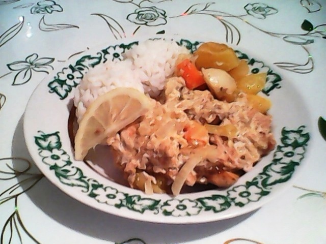 Salmon with vegetables baked in the sleeve