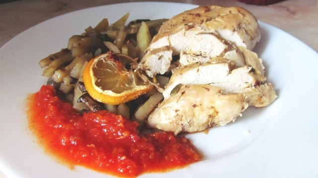 Baked chicken breast with potatoes and mushrooms